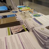 Close up of flyers and merchandise