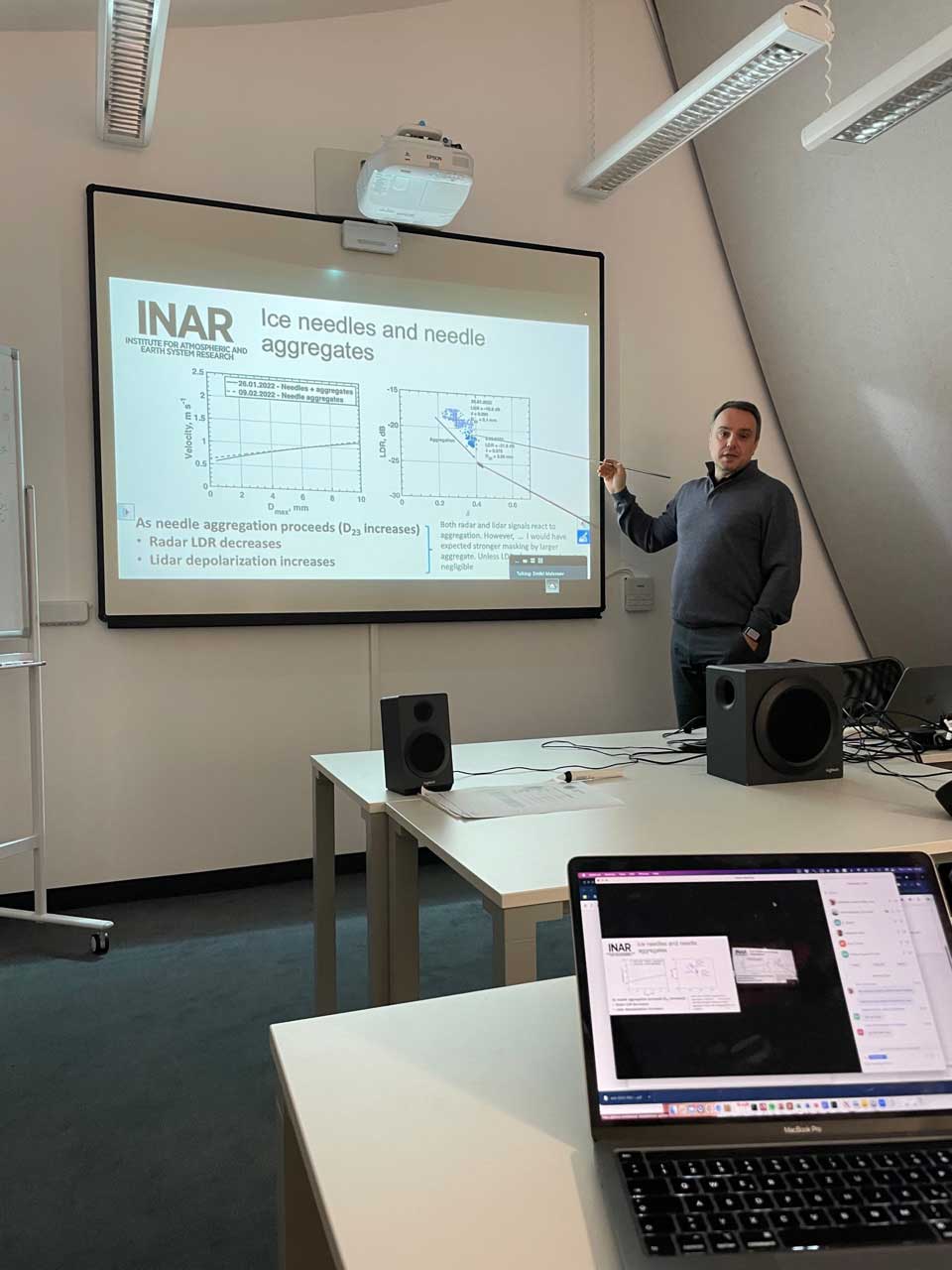 Dimitri Moisseev giving a presentation.