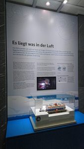Close up of an exhibition showing a research station and a lot of text