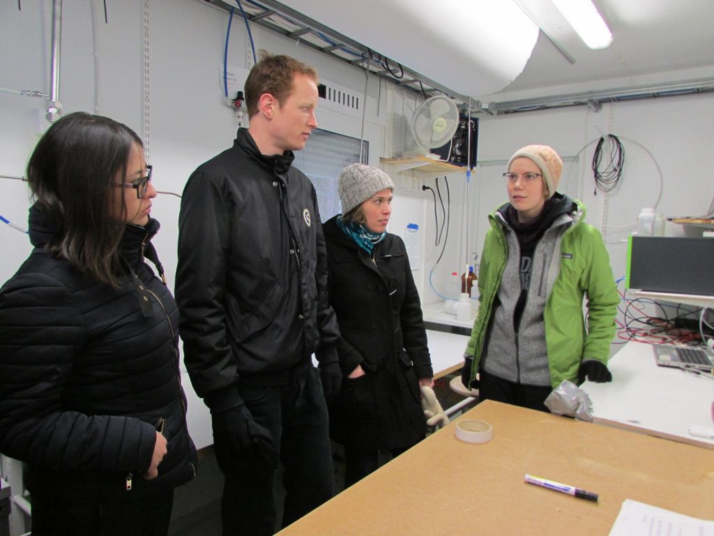 Four people in a laboratory