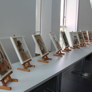 Portraits standing on a table