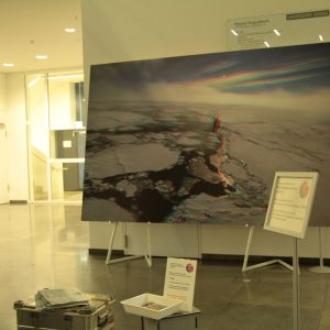 Large canvas with an icebreaker in the ice and some boxes before it