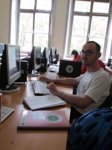 Person sitting at a laptop
