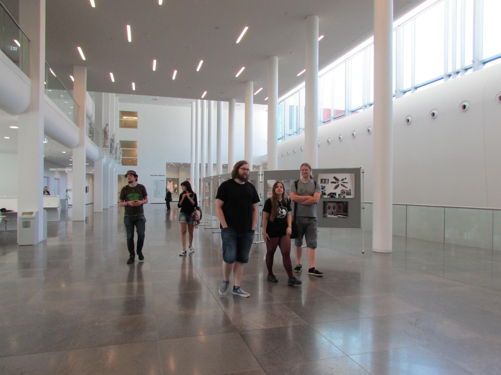 People walking through a lofty atrium