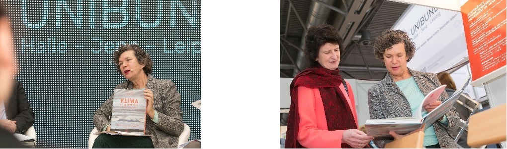 Person sitting in a char presenting a book